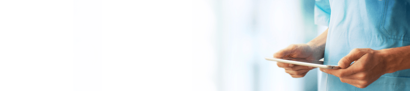 Medical Professional Holding Tablet